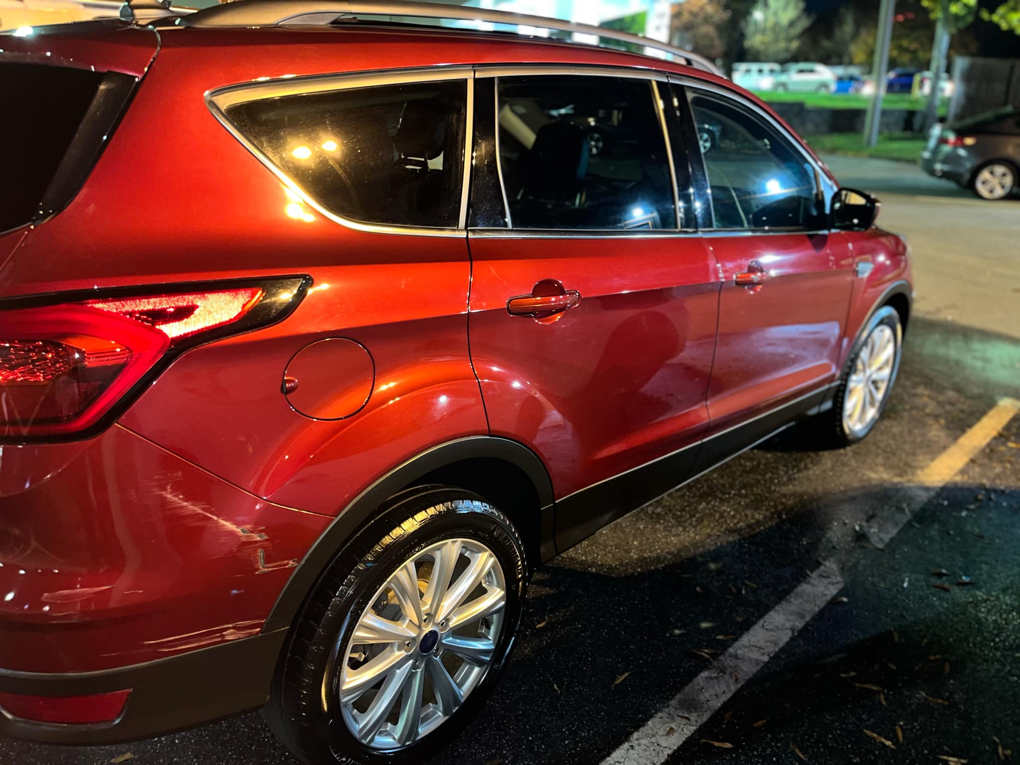 Detailed red SUV with glossy finish
